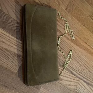 Suede and leather clutch bag